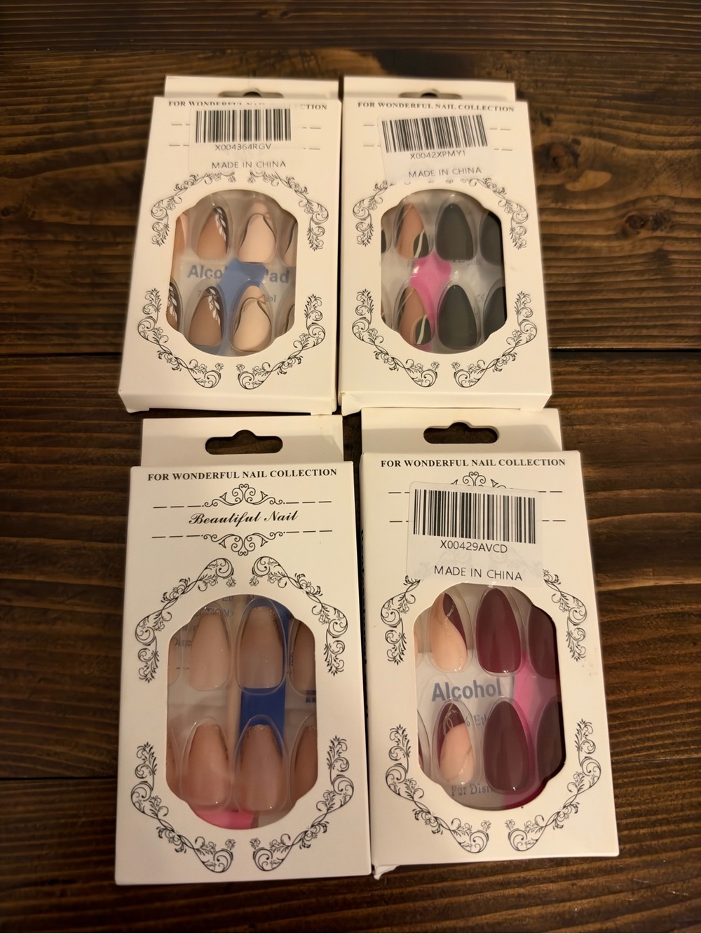 4 new packs of fake nails